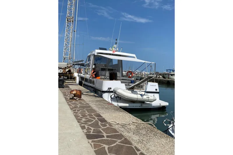 Captain Back Yacht Photos Pics 1988 Cantiere Navale di Pesaro Studio Mare Atmosfere 46 yacht docked at marina.