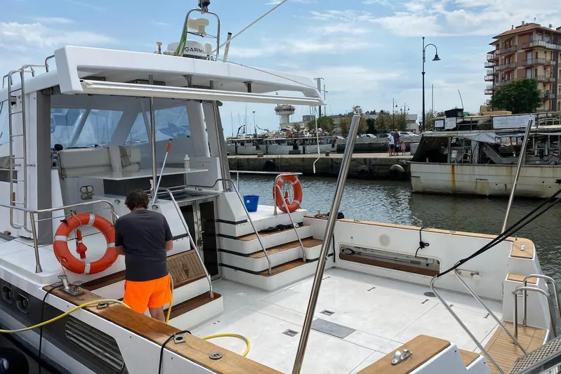 Captain Back Yacht Photos Pics 1988 Cantiere Navale di Pesaro Studio Mare Atmosfere 46 yacht docked at marina.