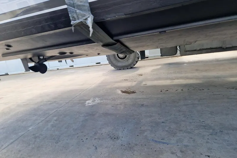 Captain Back Yacht Photos Pics Underneath view of a 1988 Studio Mare Atmosfere 46 boat on a concrete surface.