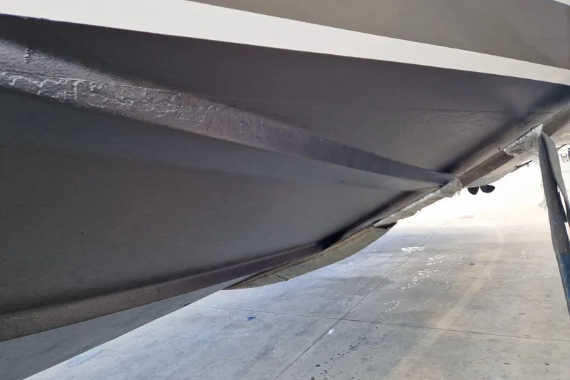 Captain Back Yacht Photos Pics Hull of 1988 Studio Mare Atmosfere 46 boat on dry dock.