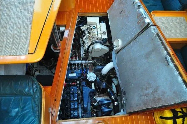 Raynad Yacht Photos Pics Engine compartment of 2000 Custom Steel Cutter World Cruiser, showcasing detailed mechanical components.