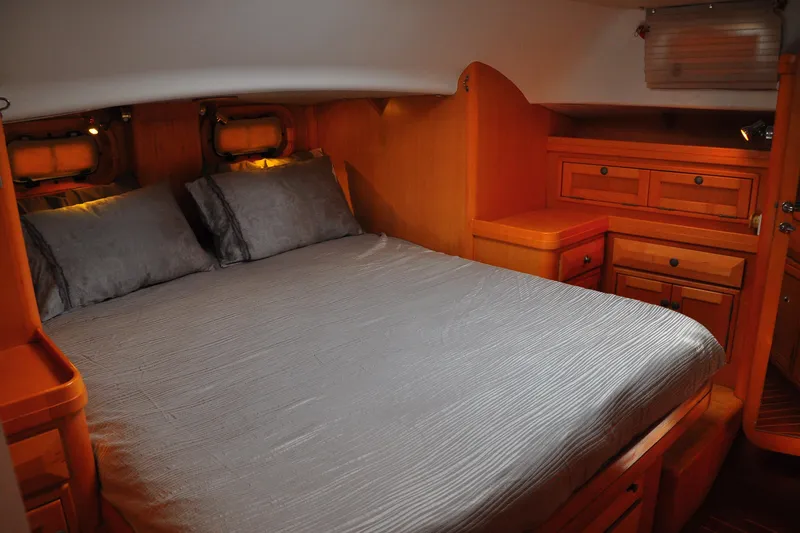 Raynad Yacht Photos Pics Luxurious cabin interior of 2000 Custom Steel Cutter World Cruiser yacht.