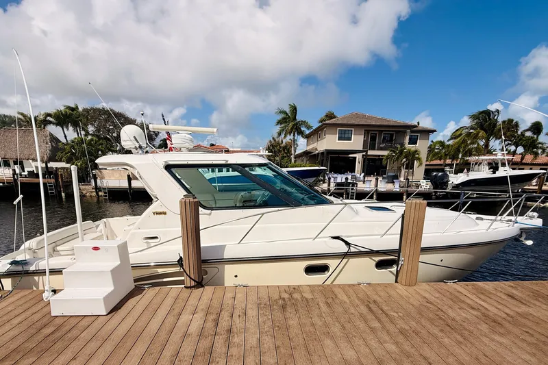 Lola Yacht Photos Pics 2005 Tiara Yachts 3600 Sovran docked, showcasing sleek design and luxury features.