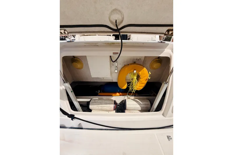 Lola Yacht Photos Pics 2005 Tiara Yachts 3600 Sovran storage compartment with life preserver and equipment.
