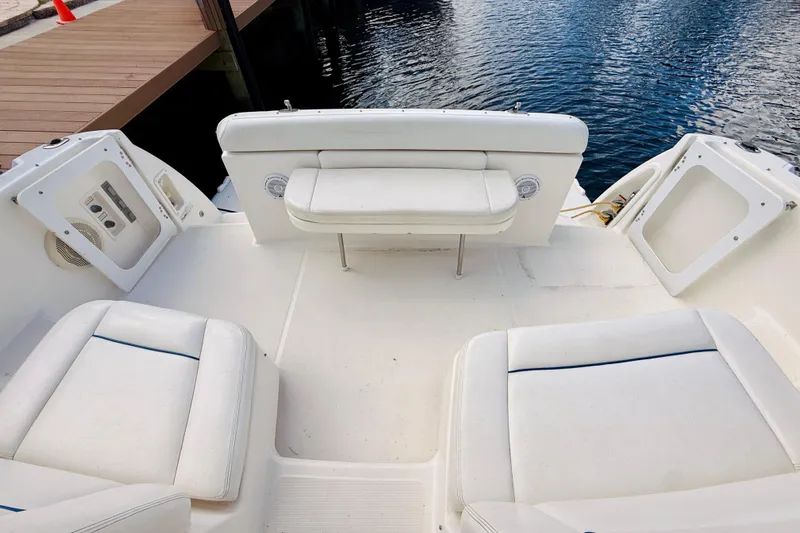 Lola Yacht Photos Pics 2005 Tiara Yachts 3600 Sovran cockpit with white seating and water view.