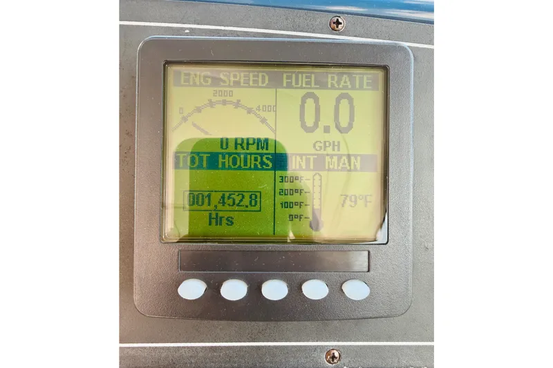 Lola Yacht Photos Pics Dashboard of 2005 Tiara Yachts 3600 Sovran showing engine hours and temperature.