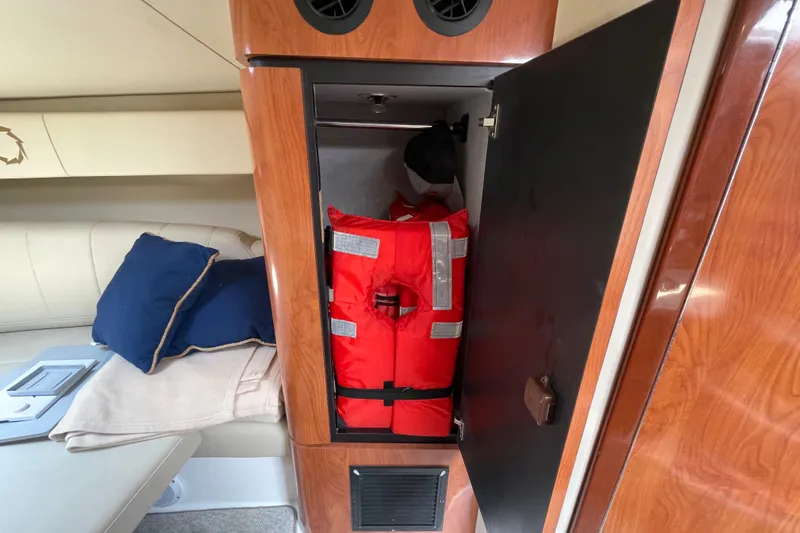  Yacht Photos Pics 2007 Fountain 38 Sportfish Cruiser OB interior with life jacket storage.