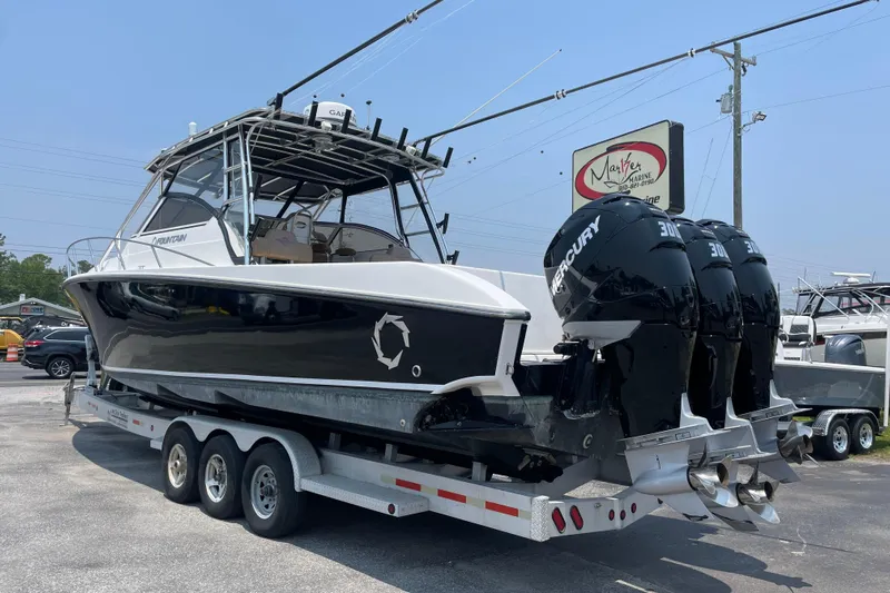  Yacht Photos Pics 2007 Fountain 38 Sportfish Cruiser OB on trailer with triple Mercury outboard engines.
