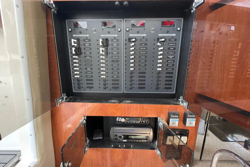  Yacht Photos Pics Electrical panel and audio system in 2007 Fountain 38 Sportfish Cruiser OB boat.