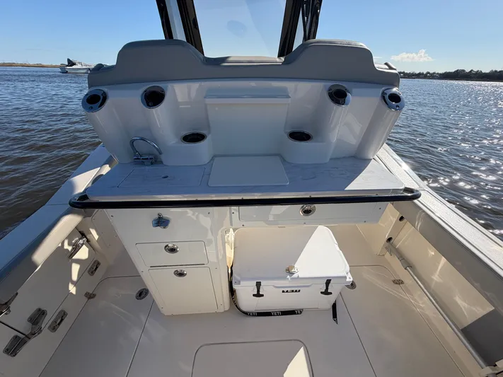  Yacht Photos Pics Interior view of Scout 260 LXF boat, 2025 model, on the water.
