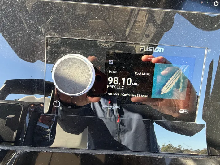  Yacht Photos Pics Scout 260 LXF 2025 boat display with radio settings.