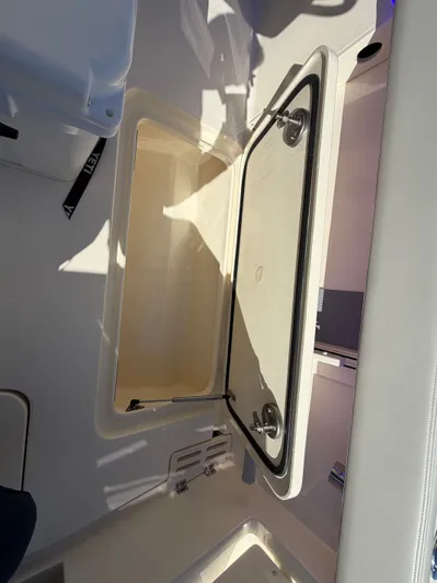  Yacht Photos Pics Open storage compartment in 2025 Scout 260 LXF boat.