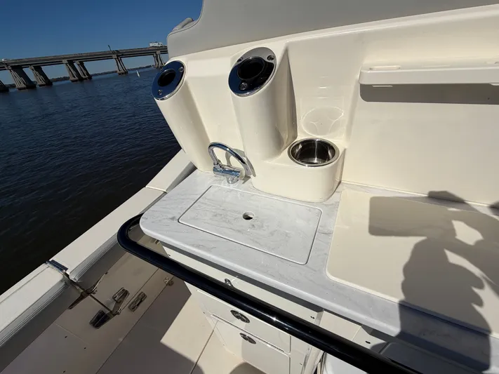 Yacht Photos Pics Scout 260 LXF 2025 with onboard kitchenette and faucet.
