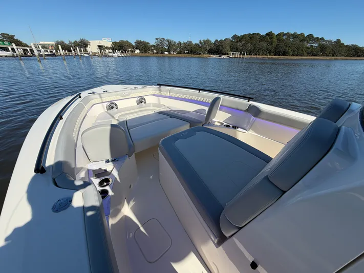  Yacht Photos Pics Interior view of 2025 Scout 260 LXF boat on calm water.