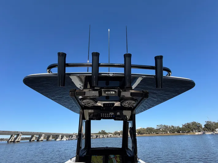  Yacht Photos Pics Scout 260 LXF 2025 boat with blue sky and water.