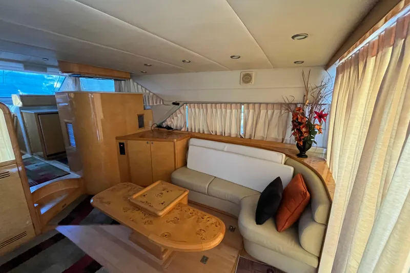  Yacht Photos Pics Luxurious interior of 2001 Jefferson International 5300 yacht with elegant seating and decor.