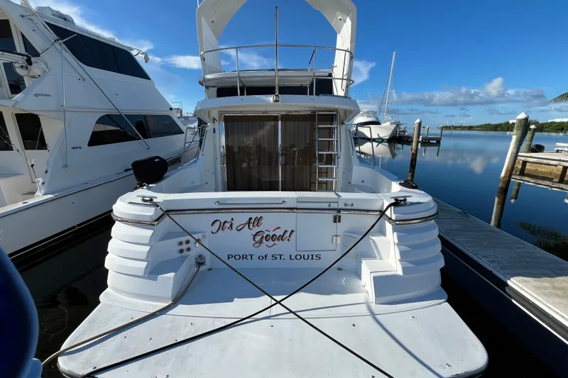  Yacht Photos Pics 2001 Jefferson International 5300 yacht docked, featuring "It's All Good!" text, Port of St. Louis.