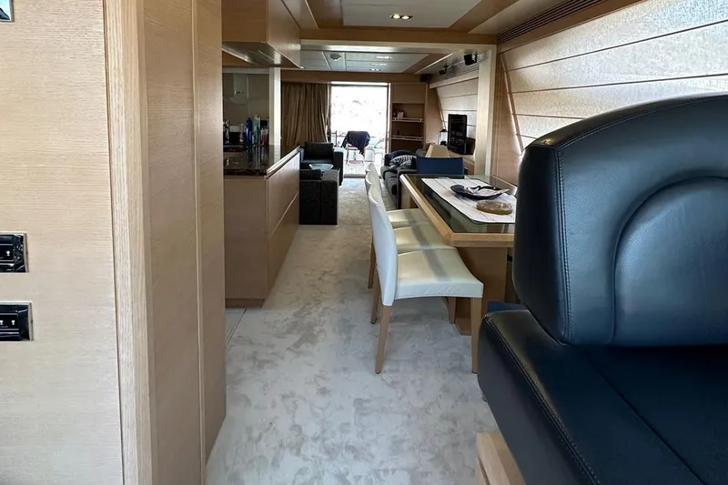  Yacht Photos Pics Luxurious interior of a 2012 Azimut 78 yacht, featuring elegant dining and seating areas.