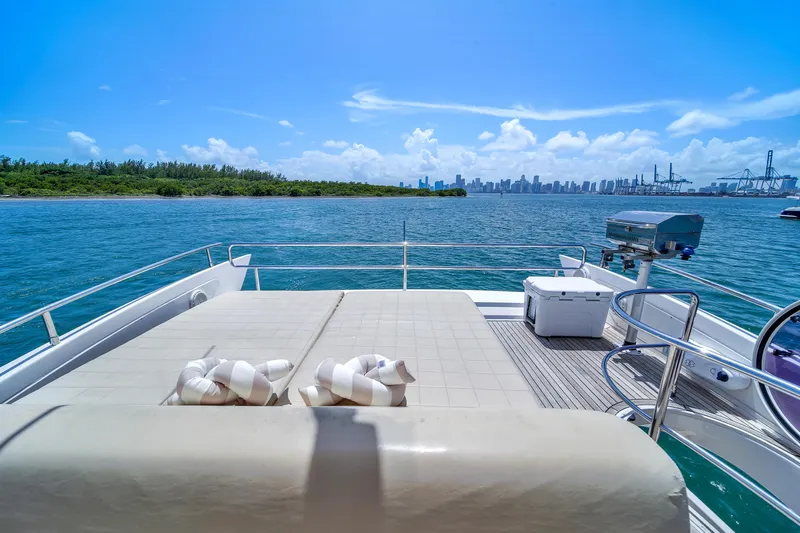  Yacht Photos Pics Azimut 64 Flybridge 2012 yacht deck with ocean view and city skyline.