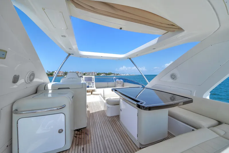  Yacht Photos Pics Luxurious 2012 Azimut 64 Flybridge yacht interior with ocean view and modern amenities.