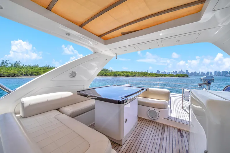  Yacht Photos Pics Luxurious 2012 Azimut 64 Flybridge yacht interior with scenic ocean view.
