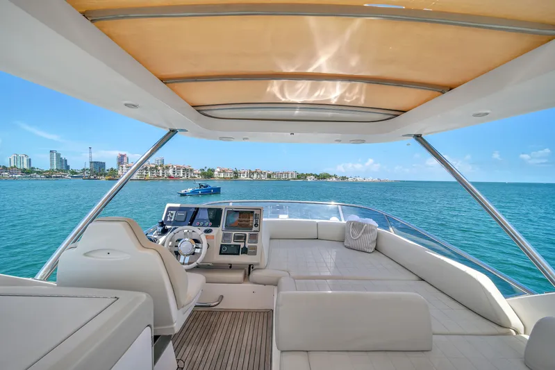  Yacht Photos Pics Luxurious 2012 Azimut 64 Flybridge yacht interior with ocean view.