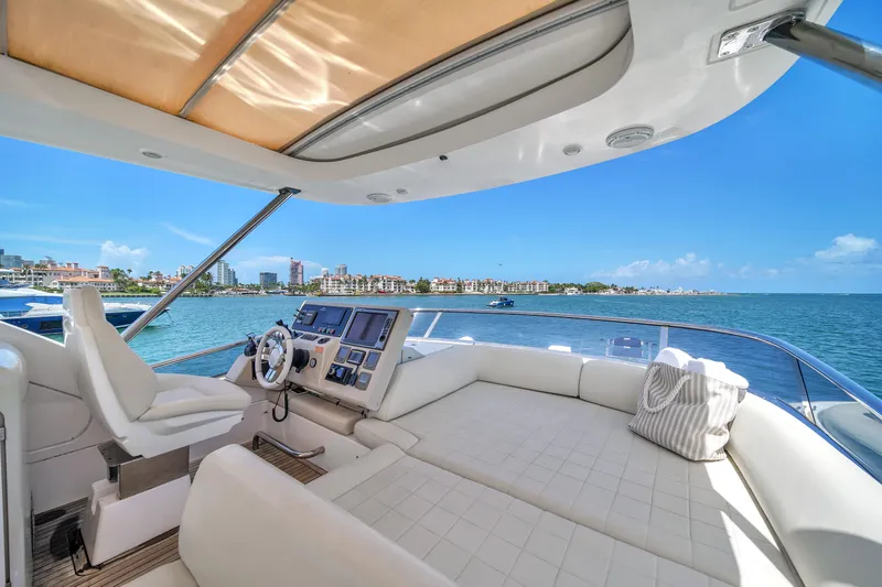 Yacht Photos Pics Luxurious 2012 Azimut 64 Flybridge yacht with spacious deck and stunning ocean view.