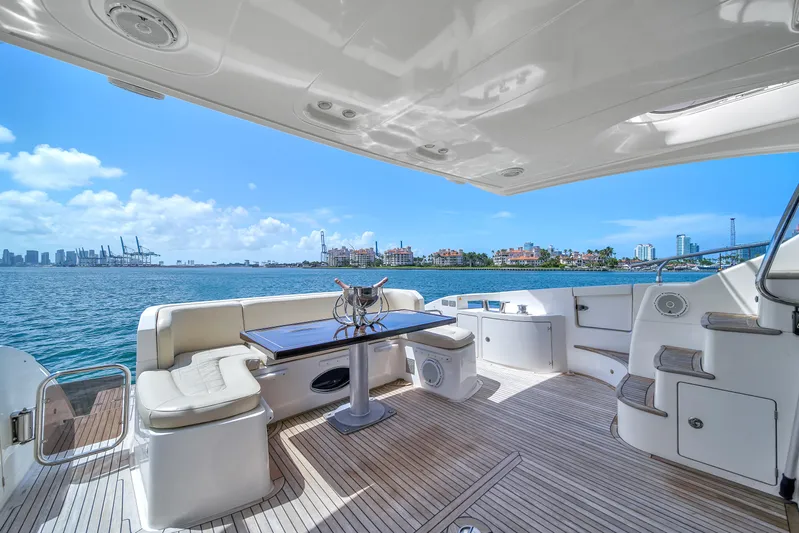  Yacht Photos Pics Azimut 64 Flybridge 2012 yacht deck with ocean view and city skyline.