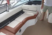 2014 Cobalt 26SD boat interior with white and brown seating, carpeted floor.