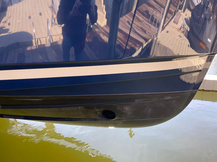 Shutter Speed II Yacht Photos Pics Ranger Tugs R-31 CB 2022 boat hull in water.