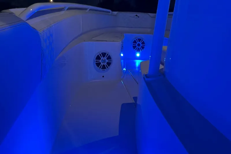  Yacht Photos Pics 2022 Streamline 26TE boat interior with blue LED lighting at night.