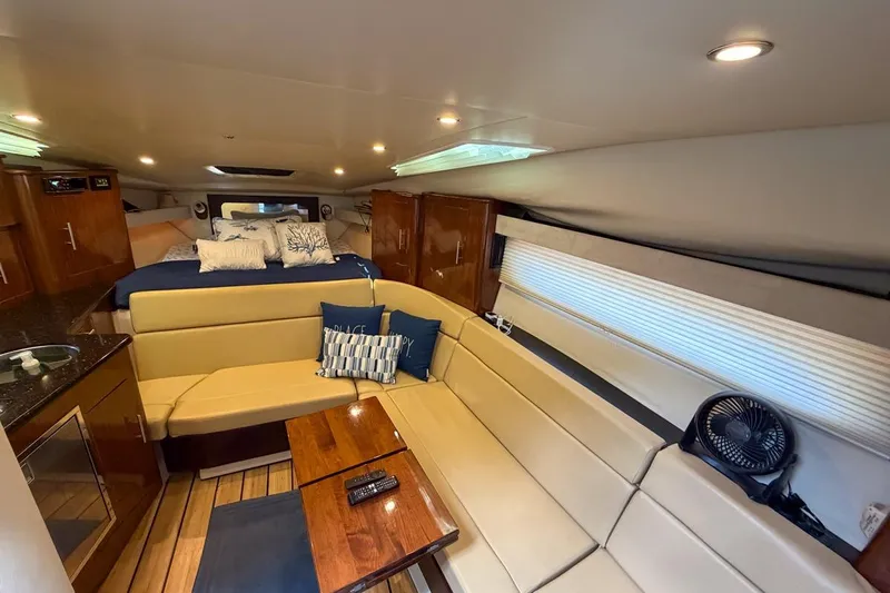 Sophia Yacht Photos Pics Interior of 2015 Regal 38 Express yacht with cozy seating and modern amenities.