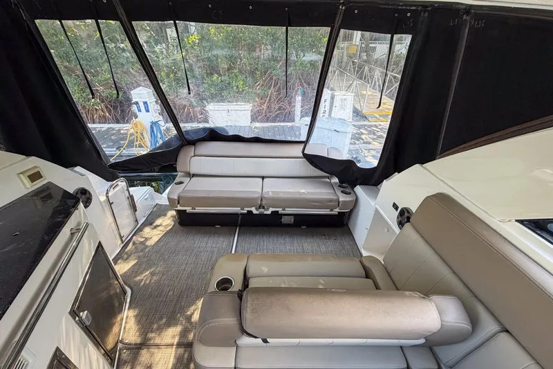 Sophia Yacht Photos Pics Interior of 2015 Regal 38 Express yacht with comfortable seating and modern design.