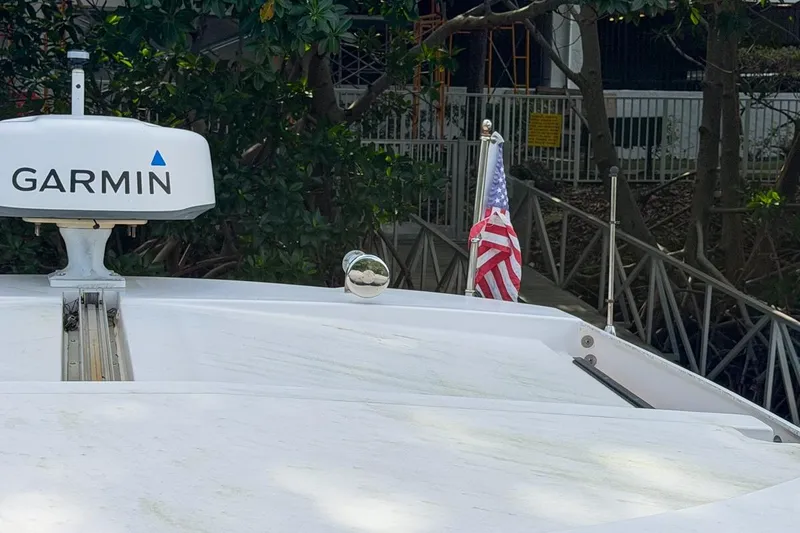 Sophia Yacht Photos Pics 2015 Regal 38 Express boat with Garmin radar and American flag.