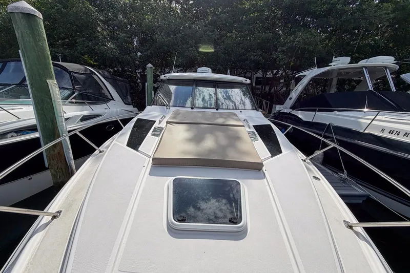 Sophia Yacht Photos Pics 2015 Regal 38 Express yacht docked, featuring sleek design and spacious deck.