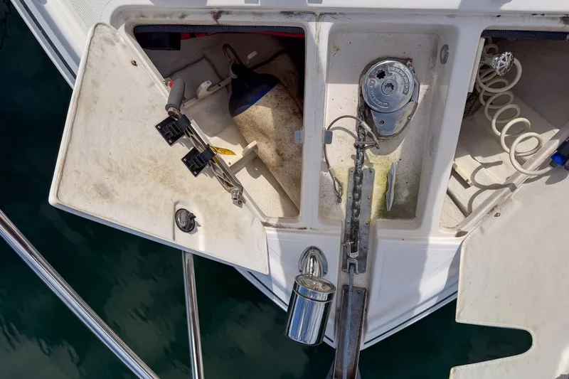 Sophia Yacht Photos Pics 2015 Regal 38 Express boat anchor compartment with open hatch and visible equipment.