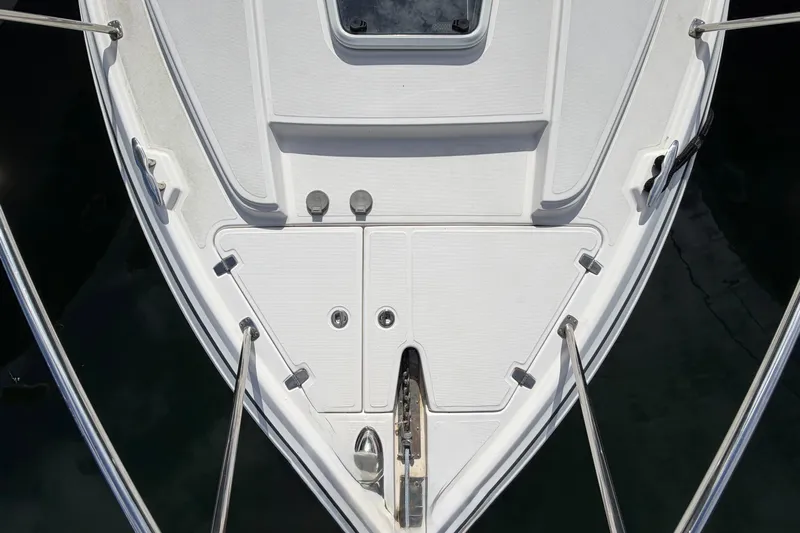 Sophia Yacht Photos Pics Bow of a 2015 Regal 38 Express boat with stainless steel railings.
