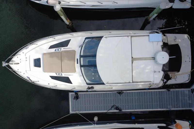 Sophia Yacht Photos Pics Aerial view of a 2015 Regal 38 Express yacht at dock.