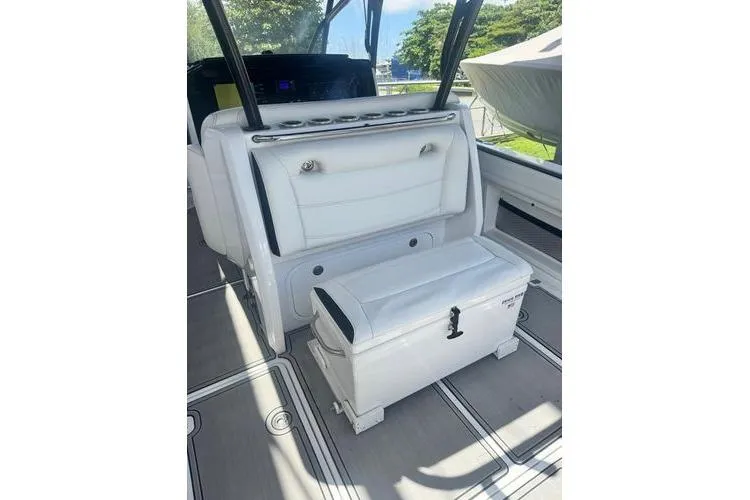 No Name Yacht Photos Pics 2019 Nor-Teck 390 Sport Center Console interior with white seating and storage.