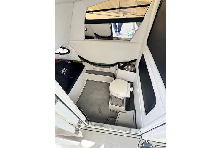 No Name Yacht Photos Pics Interior of 2019 Nor-Teck 390 Sport Center Console with compact marine toilet.