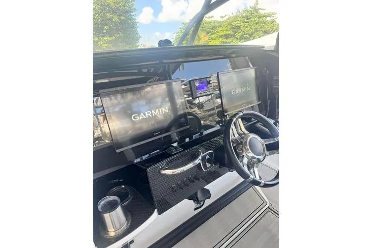 No Name Yacht Photos Pics 2019 Nor-Teck 390 Sport Center Console with Garmin displays and sleek steering wheel.