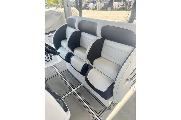 No Name Yacht Photos Pics 2019 Nor-Teck 390 Sport Center Console seating, featuring luxurious black and white upholstery.