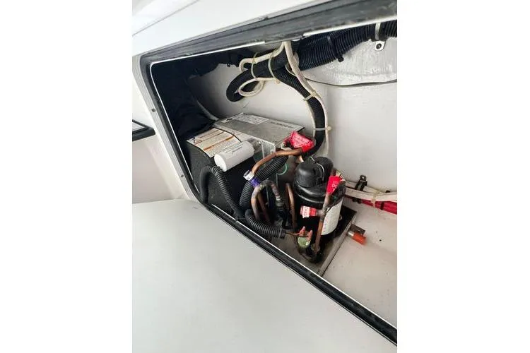 No Name Yacht Photos Pics 2019 Nor-Teck 390 Sport Center Console electrical compartment with wiring and components.