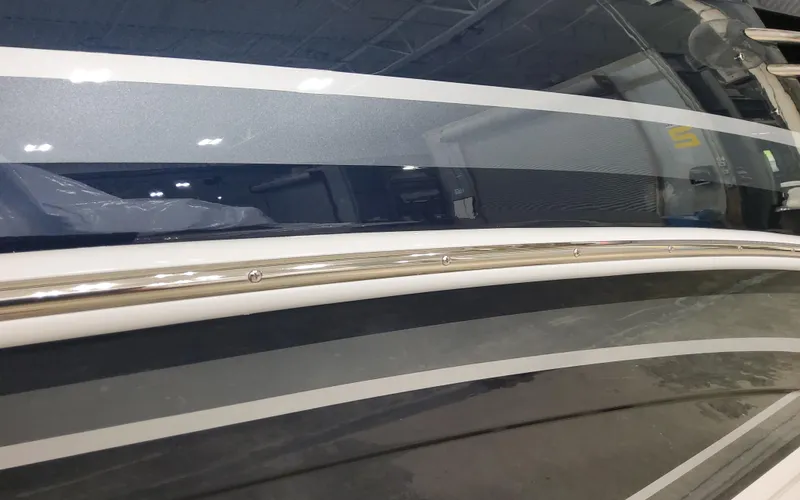  Yacht Photos Pics 2026 Formula 290 Bowrider boat with sleek, modern design and metallic accents.
