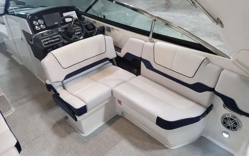  Yacht Photos Pics 2026 Formula 290 Bowrider interior with luxurious seating and modern dashboard.