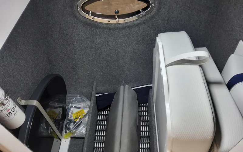  Yacht Photos Pics Interior storage of 2026 Formula 290 Bowrider boat with cushions and equipment.