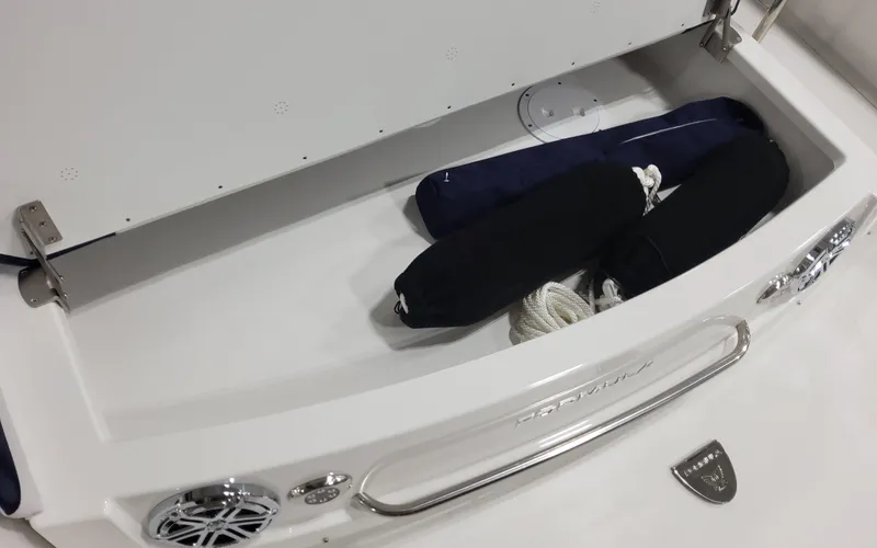  Yacht Photos Pics 2026 Formula 290 Bowrider storage compartment with ropes and fenders.