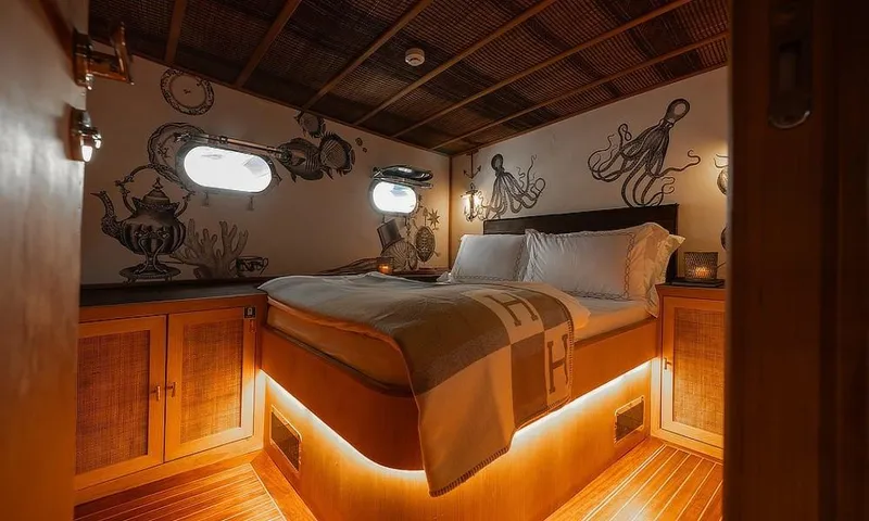 27 M Deluxe Gulet Yacht Photos Pics Luxurious cabin interior of 2003 Custom Made Motorsailor with nautical decor and ambient lighting.