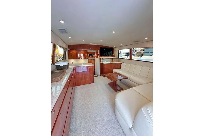 Baby Grand Yacht Photos Pics Luxurious interior of 2006 Egg Harbor 43 Sport Yacht with elegant seating and modern amenities.