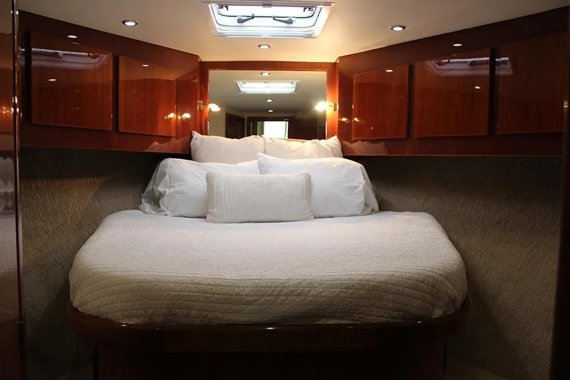 Baby Grand Yacht Photos Pics Luxurious cabin interior of 2006 Egg Harbor 43 Sport Yacht with cozy bedding.
